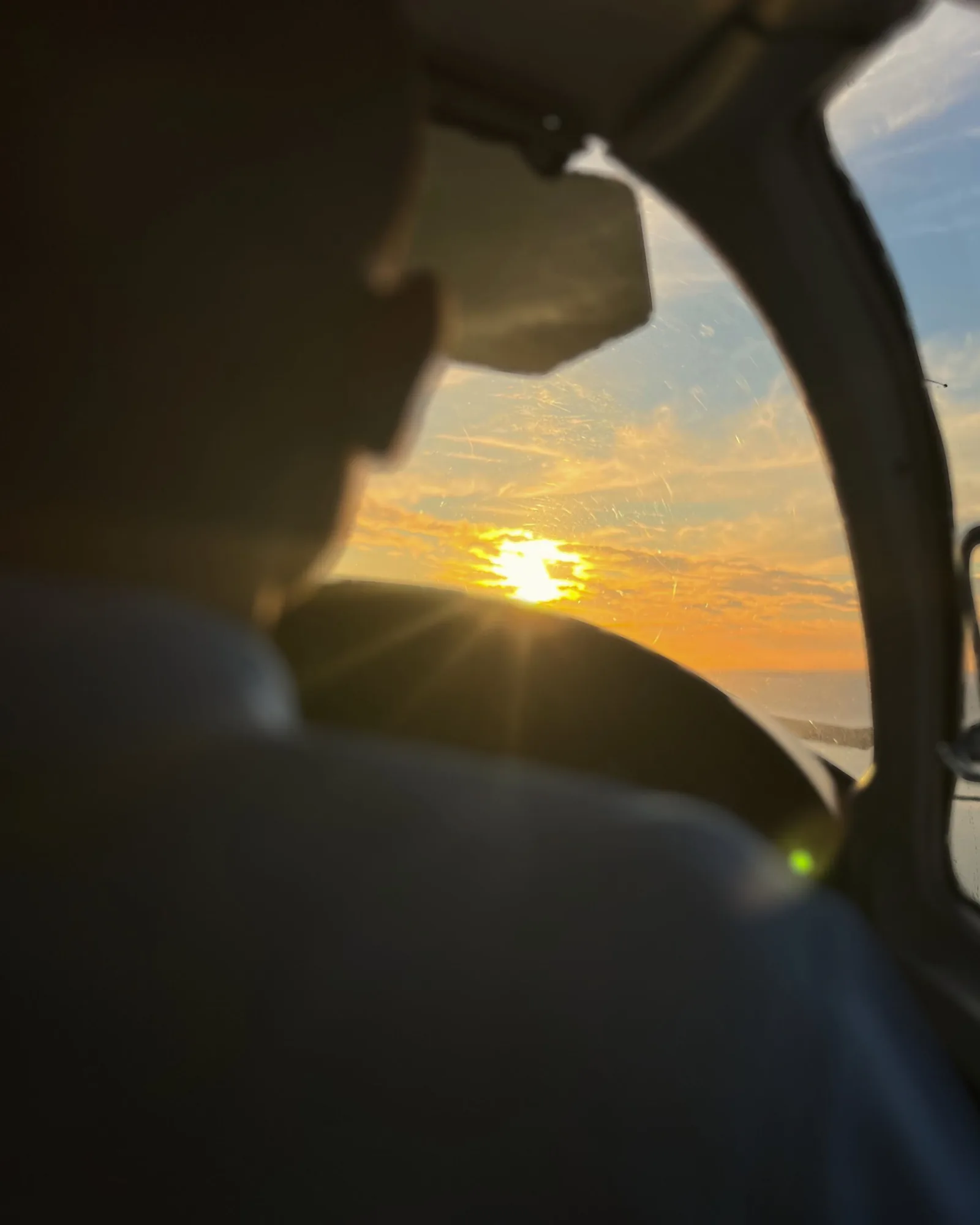 Sunset from a Caicos Express cockpit